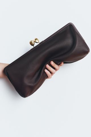 Metal Trim Leather Clutch