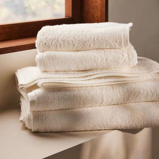 Organic Ribbed Bath Towels on a window ledge.