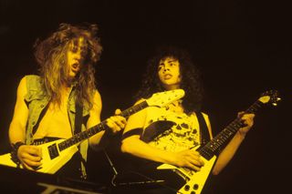 James Hetfield (left) and Kirk Hammett perform onstage with Metallica during the band's early days