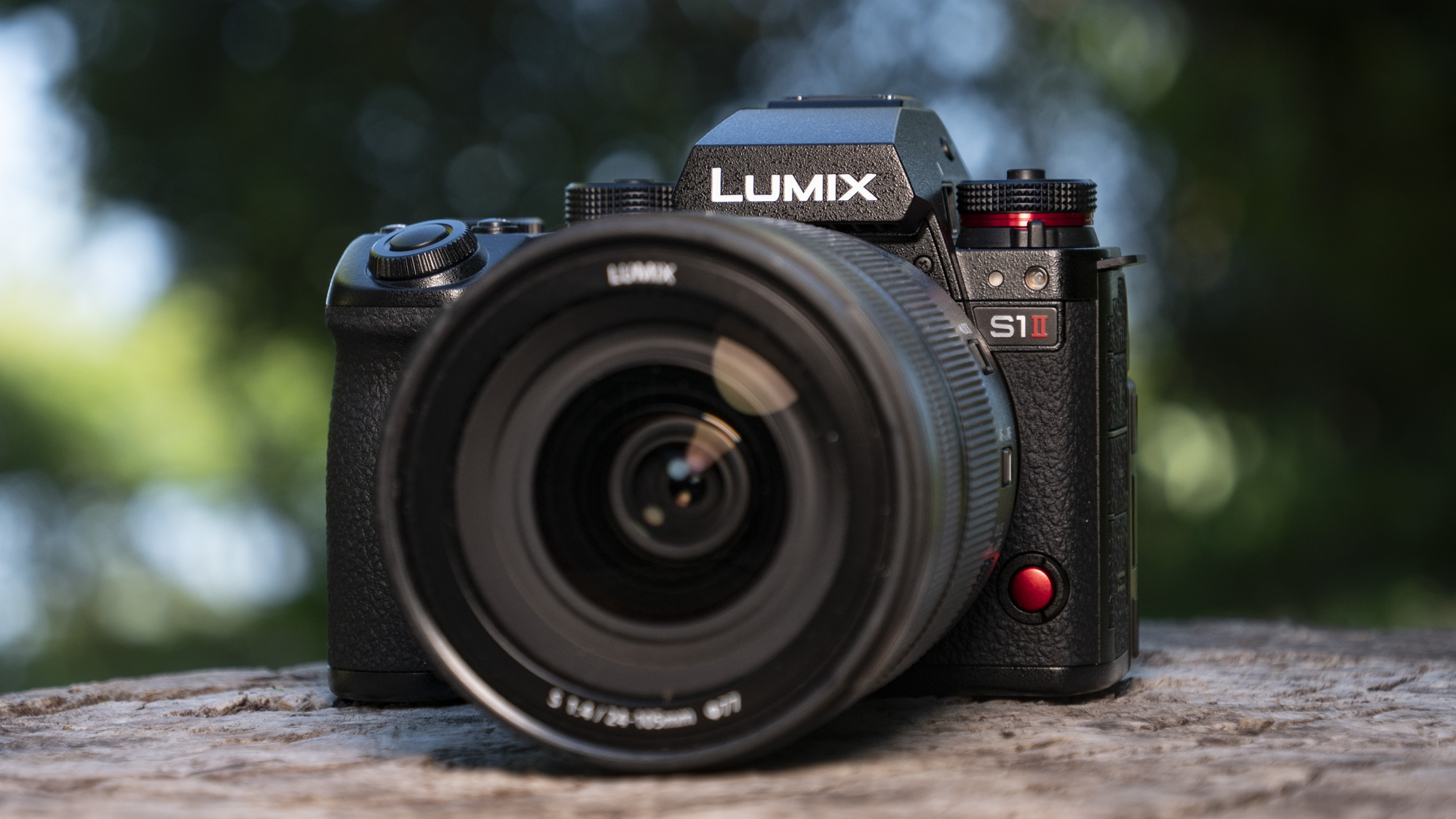 Panasonic Lumix S1 II mirrorless camera outdoors on a wooden surface