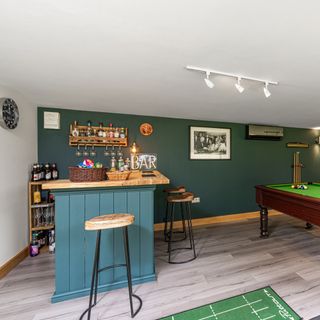 Home bar setup in games room in Green Retreats garden room