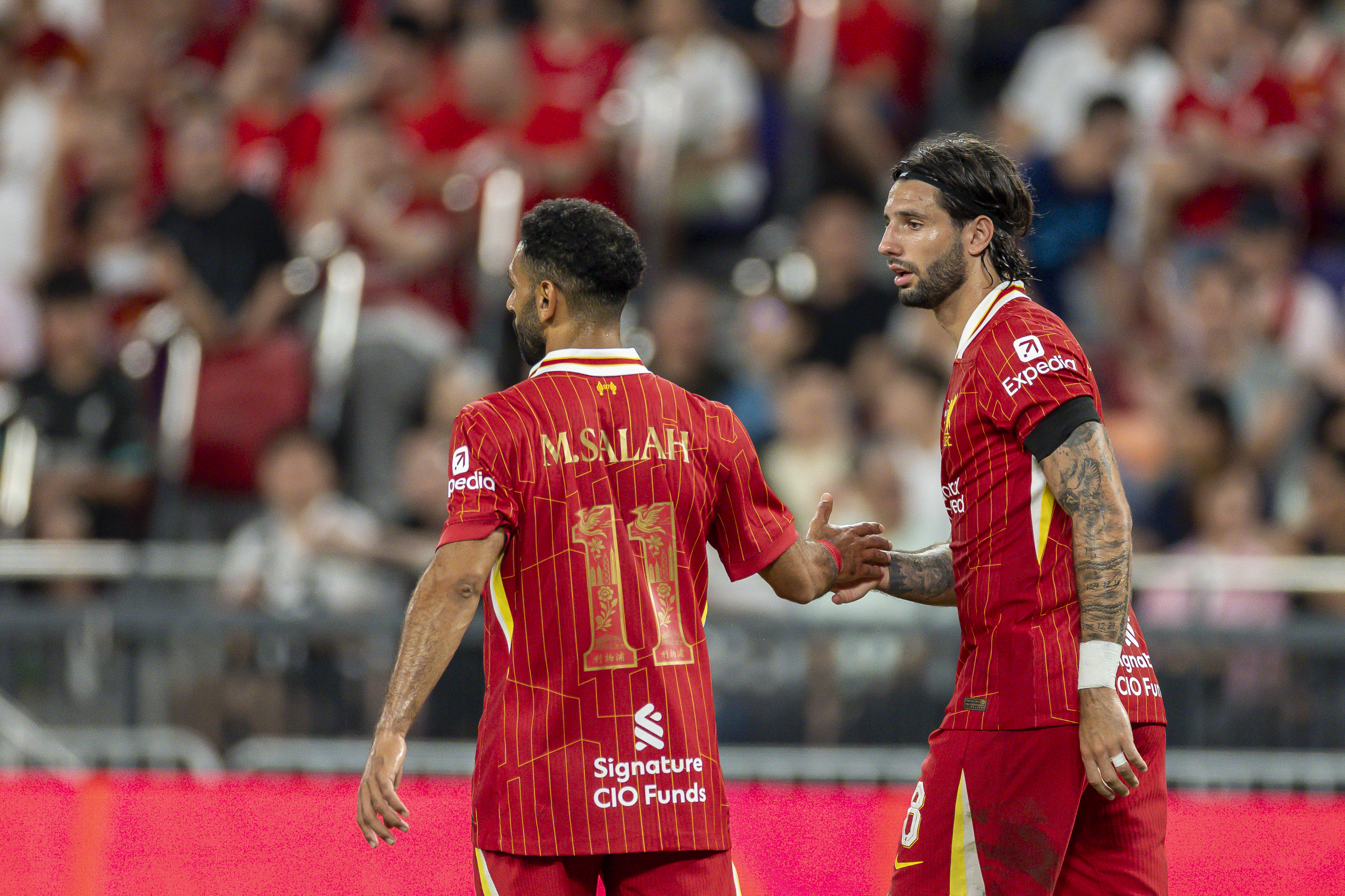 Liverpool duo Mohamed Salah and Dominik Szoboszlai in action during pre-season