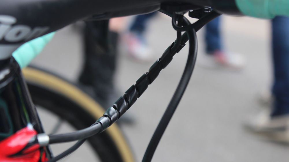 A neat solution to keep the Di2 cables tidy with the brake cables