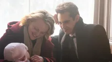 Elisabeth Moss as June and Max Minghella in The Handmaid's Tale