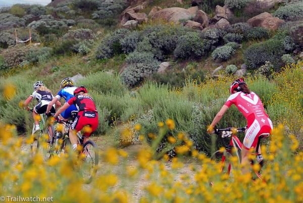 Lea Davison (Specialized) dangling behind the leaders.