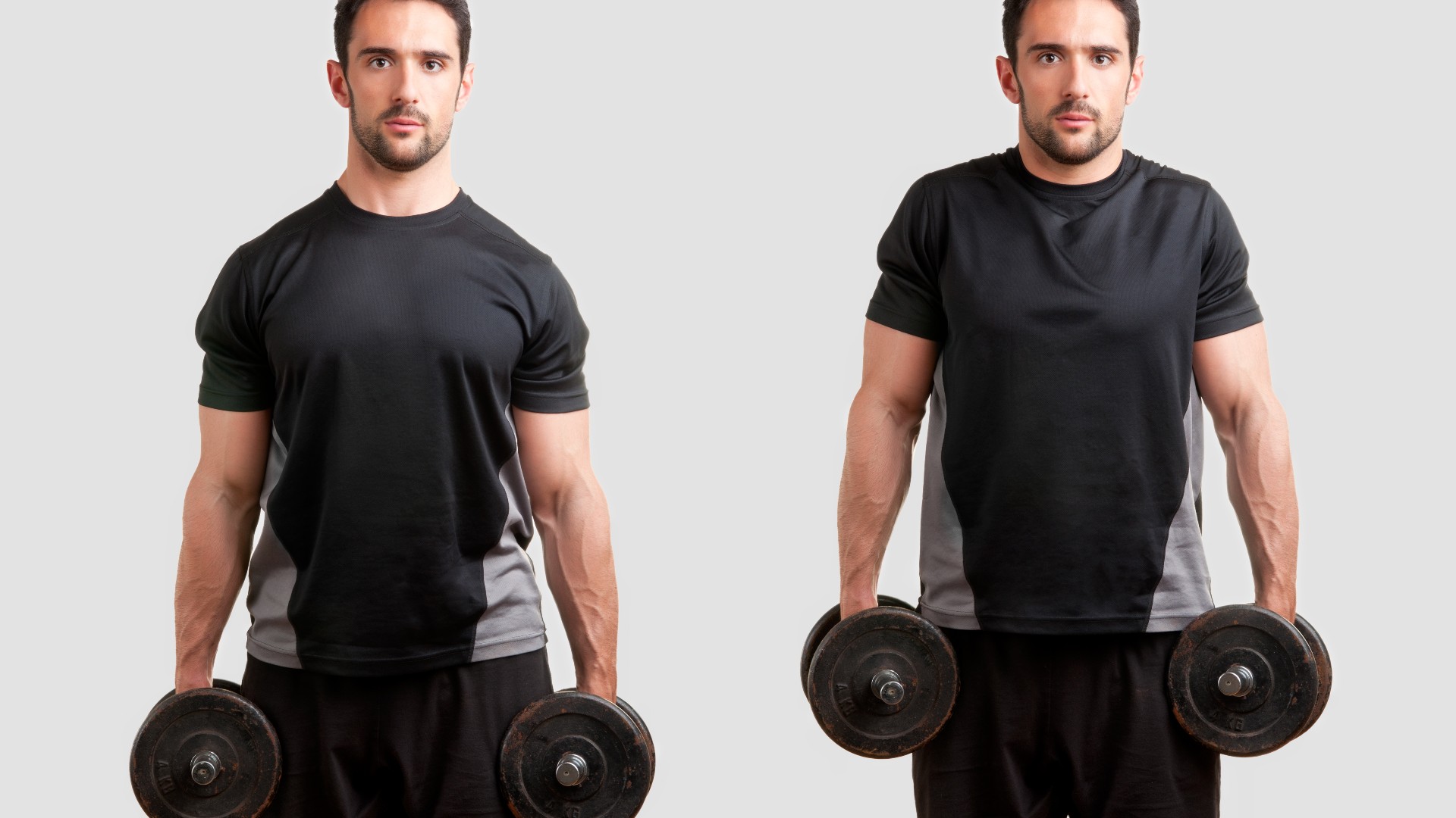 Personal trainer holding two dumbbells performing a dumbbell shrug against grey backdrop