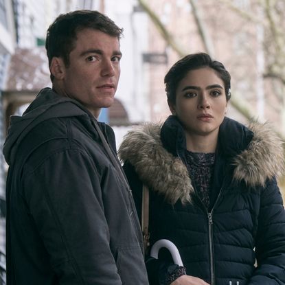 Gabriel Basso as Peter Sutherland and Arienne Mandi as Noor on a new york street in the night agent season 2