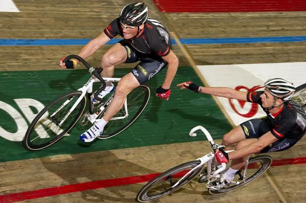 Steven De Neef is slung into the action by teammate Steve Schets.