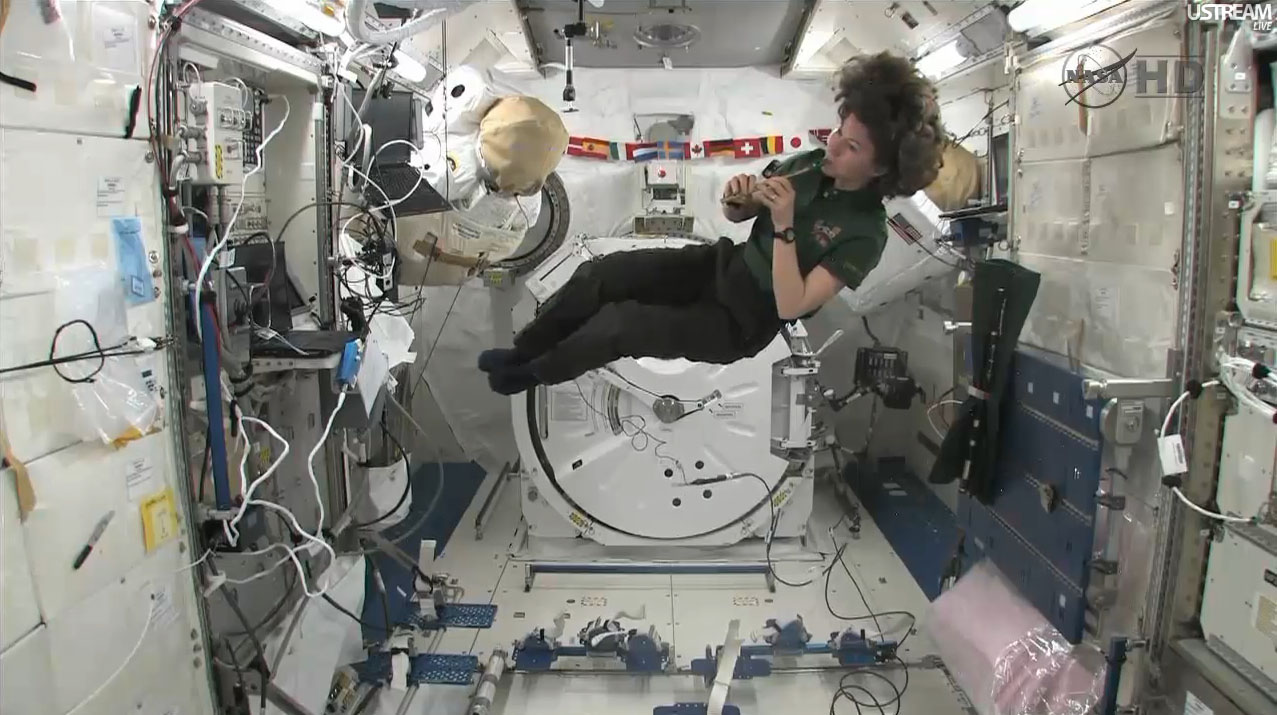 Irish astronaut Cady Coleman plays a pennywhistle on loan from the Irish band The Chieftains while flying in the Japanese Kibo lab on the International Space Station on St. Patrick&#039;s Day, March 17, 2011. 