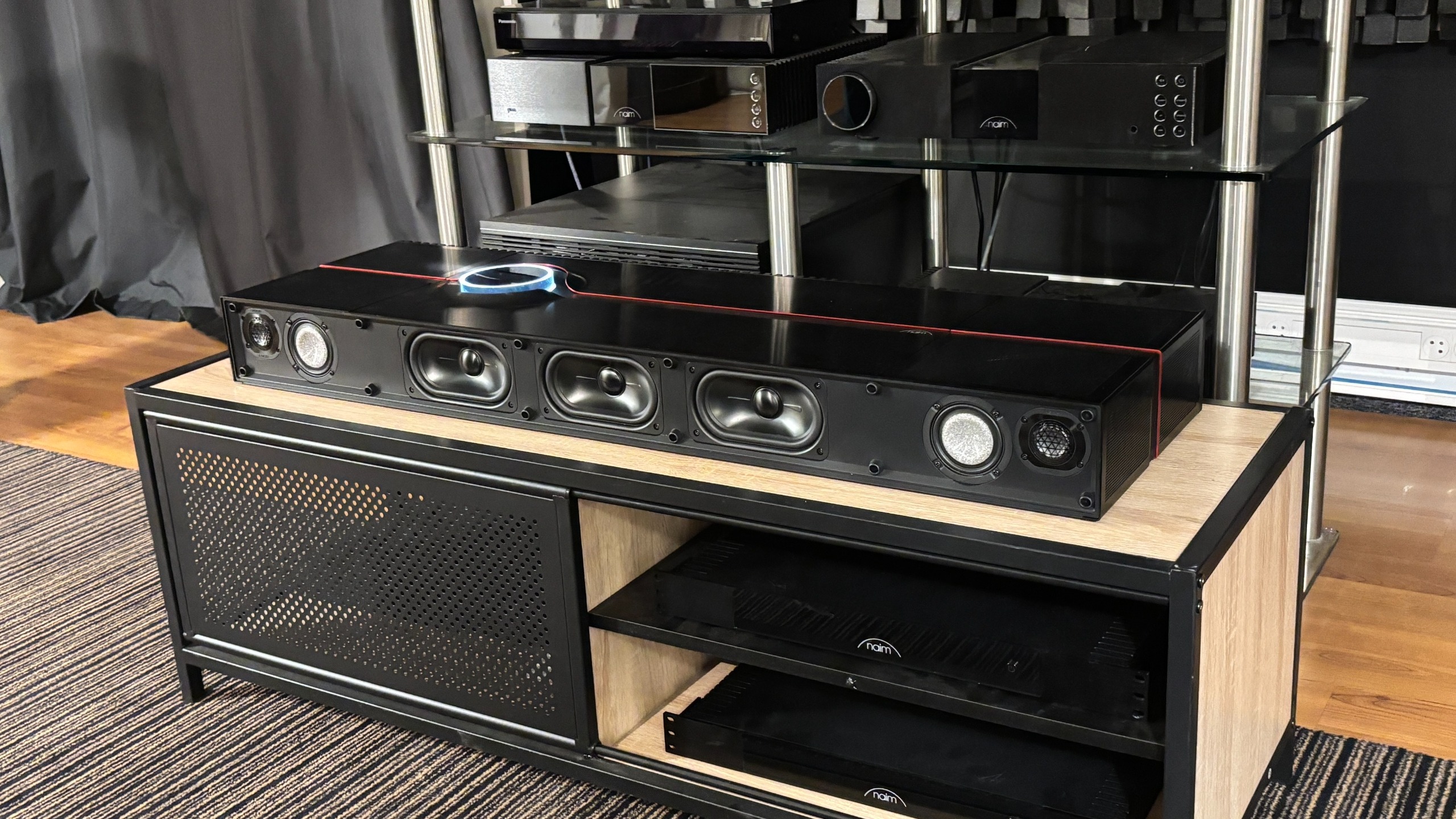 Naim Mu-so Utopia with the front grille removed to expose its drive units
