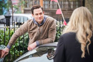 Sharon's brother Zack pulls up in the Square in EastEnders
