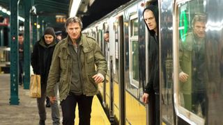 (L-R) Liam Neeson as Jimmy 'The Gravedigger' Conlon and Joel Kinnaman as Mike Conlon in "Run All Night"