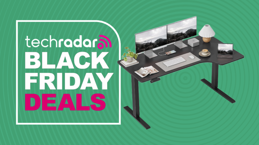 A compact Fezibo L-shaped standing desk on a green background next to a TechRadar badge reading &#039;Black Friday deals&#039;