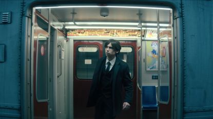 Five (Aidan Gallagher) steps off a subway, in &#039;The Umbrella Academy&#039; season 4