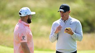 Rory McIlroy talks to Tyrrell Hatton at The Open