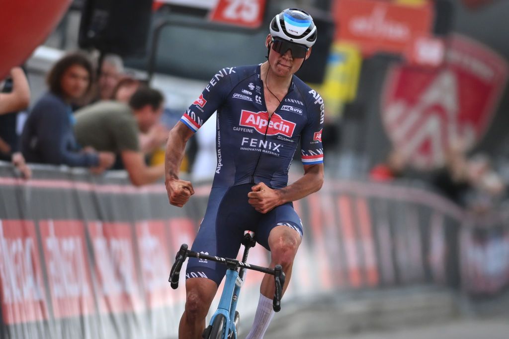 Dutch Mathieu van der Poel of AlpecinFenix celebrates as he crosses the finish line to win the Antwerp Port Epic cycling race 183km in and around Antwerp Sunday 12 September 2021 BELGA PHOTO DAVID STOCKMAN Photo by DAVID STOCKMANBELGA MAGAFP via Getty Images