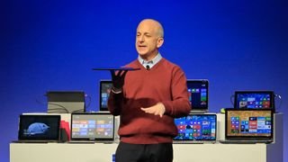 Steven Sinofsky, president of Microsoft's Windows division, introduces a new tablet computer and Windows 8 software to the media in Shanghai on October 23, 2012.