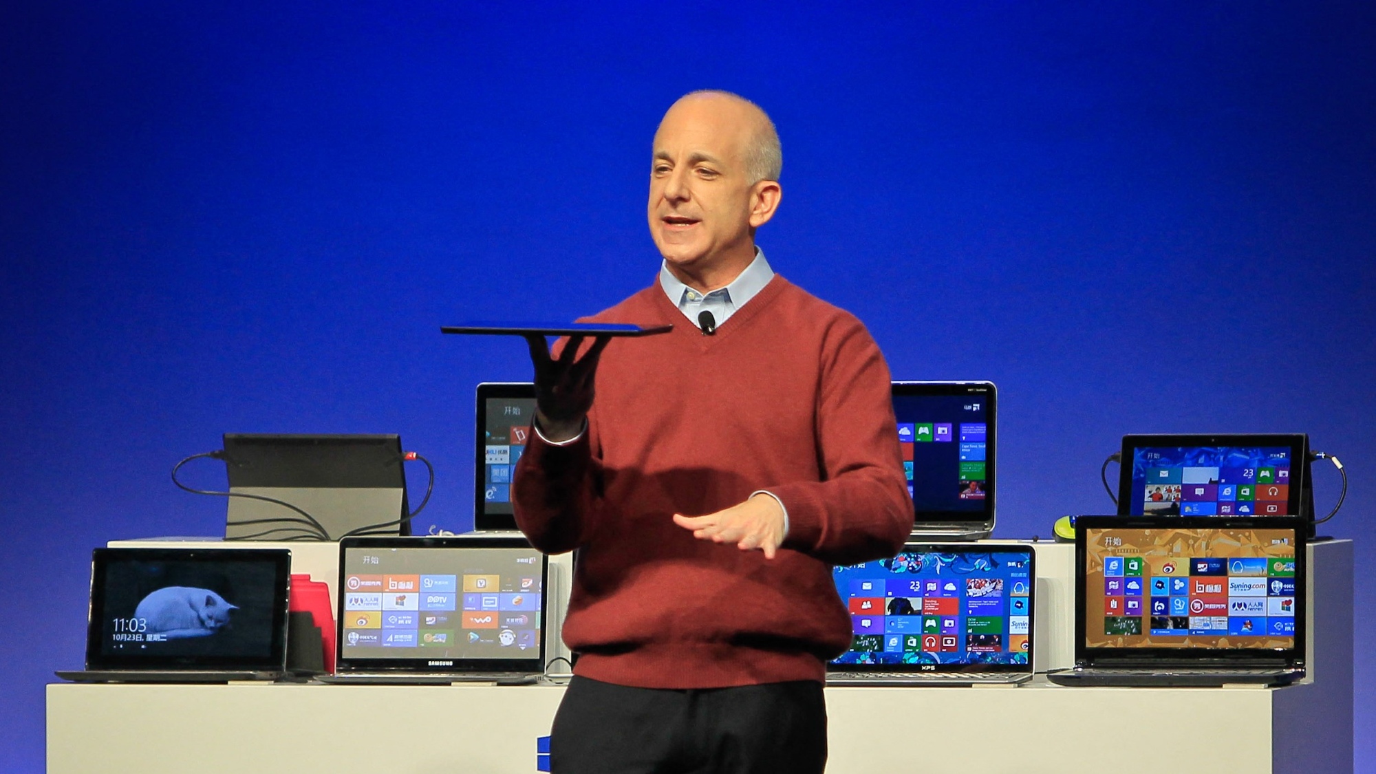 Steven Sinofsky, president of Microsoft's Windows division, introduces a new tablet computer and Windows 8 software to the media in Shanghai on October 23, 2012.