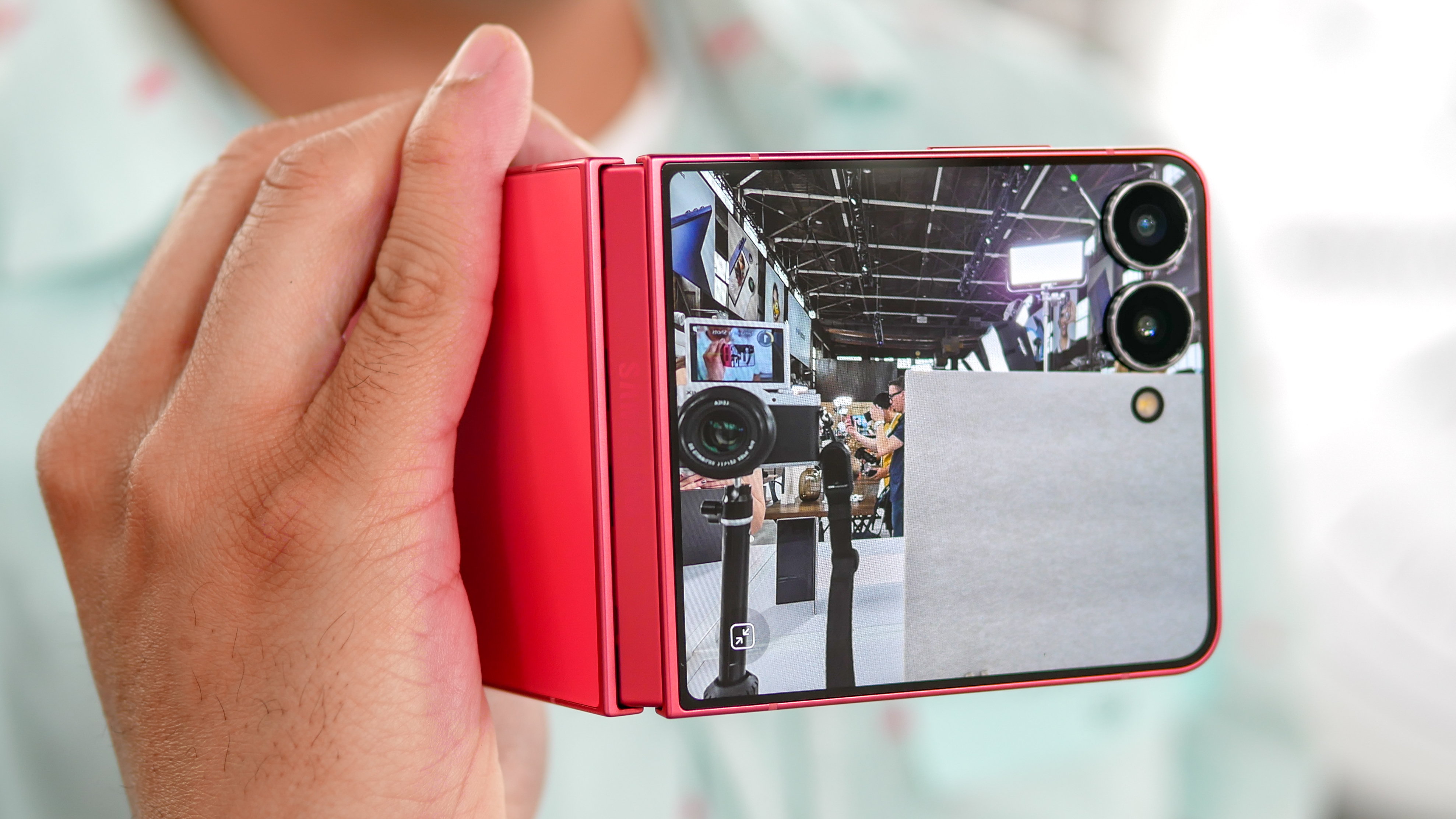 Samsung Galaxy Z Flip 7 held in the hand.
