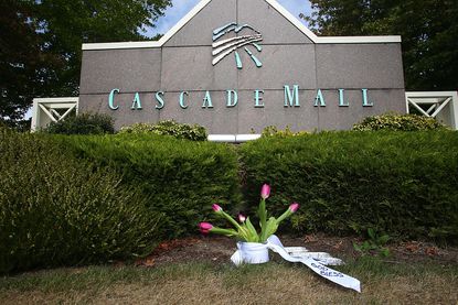 An impromptu memorial outside Cascade Mall in Washington State, where five people were killed in a mass shooting