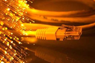 Fiber-optic cable under yellow light