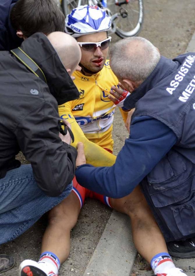Paris-Nice leaderNacer Bouhanni (FDJ) is examined after sustaining cuts to his face from a crash. The French champion abandoned the race and was taken to hospital.