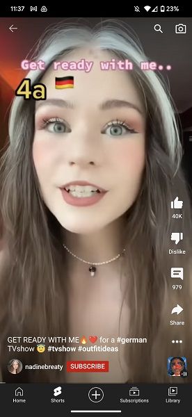 A YouTube Short with the background song's cover at the bottom right.