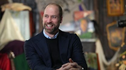 Prince William smiling as he visits the London Screen Academy 