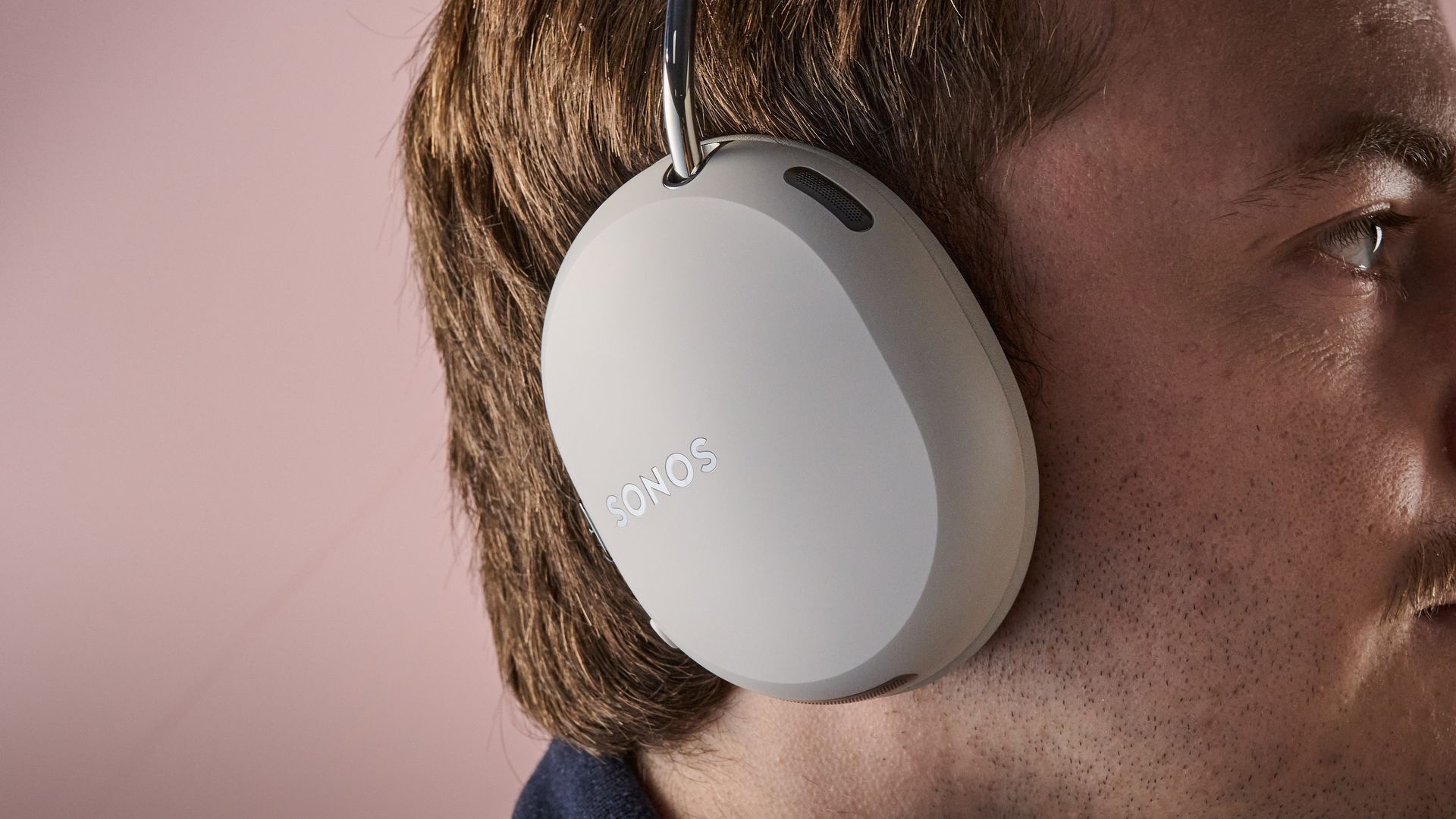 Close-up of man wearing the Sonos Ace Ultra
