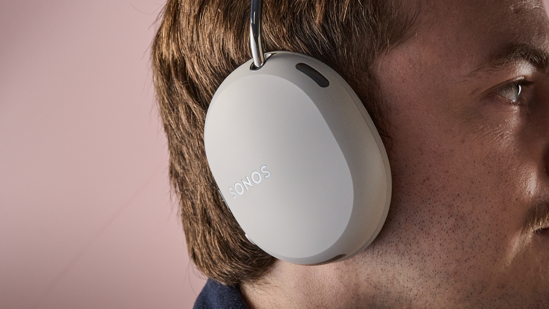 Close-up of man wearing the Sonos Ace Ultra