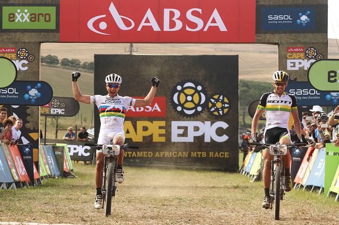 Nino Schurter and Philip Buys of SCOTT-Odlo MTB Racing celebrate as they win the 4th stage