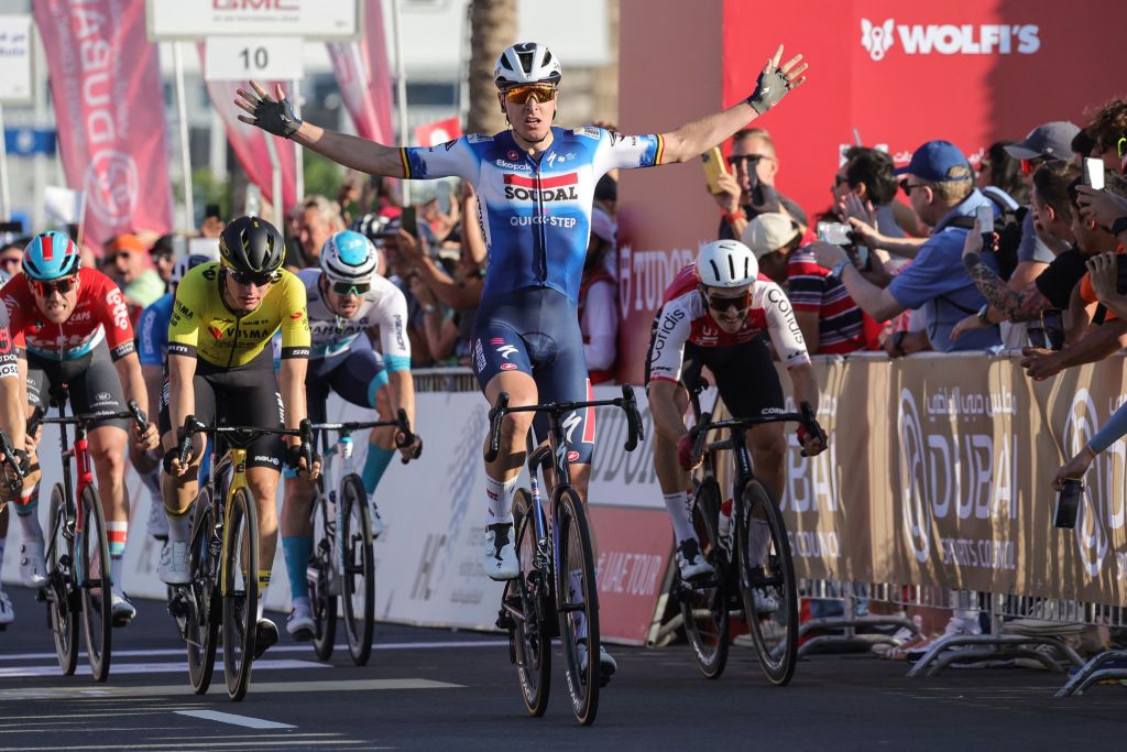 Soudal-Quick Step Team's Belgian cyclist Tim Merlier wins the fourth stage of the 6th UAE Cycling Tour, in Dubai, on February 22, 2024. (Photo by Giuseppe CACACE / AFP)