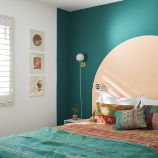 bedroom paint ideas, bedroom with green wall, pale coral semi circle, artwork, paisley bedding