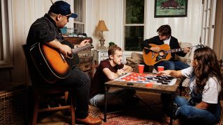 Epiphone Inspired by Gibson Custom Acoustic Collection (L-R): 1942 Banner J-45 and the 1963 Dove.