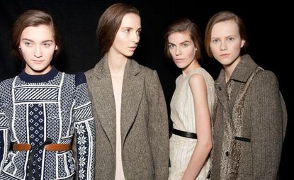 four female models at the Maison Martin Margiela's Winter show 2014