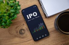 IPO on smartphone with "initial public offering" spelled out underneath