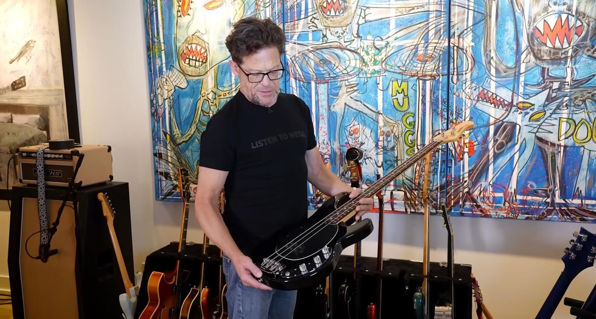 Jason Newsted with his 3-string Tony Levin Ernie Ball Music Man bass