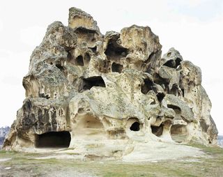 huge rock with caves