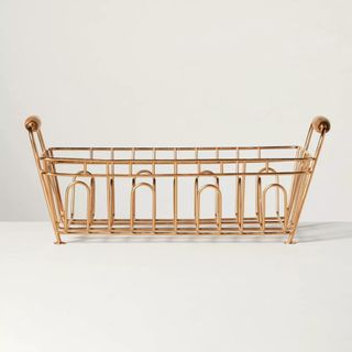 A Metal Drying Rack Copper Finish from Hearth & Hand with Magnolia