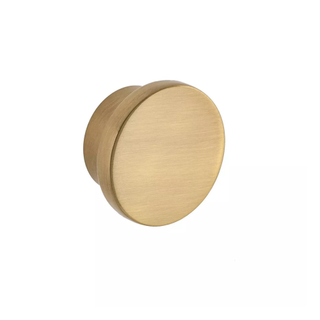 A brass cabinet knob