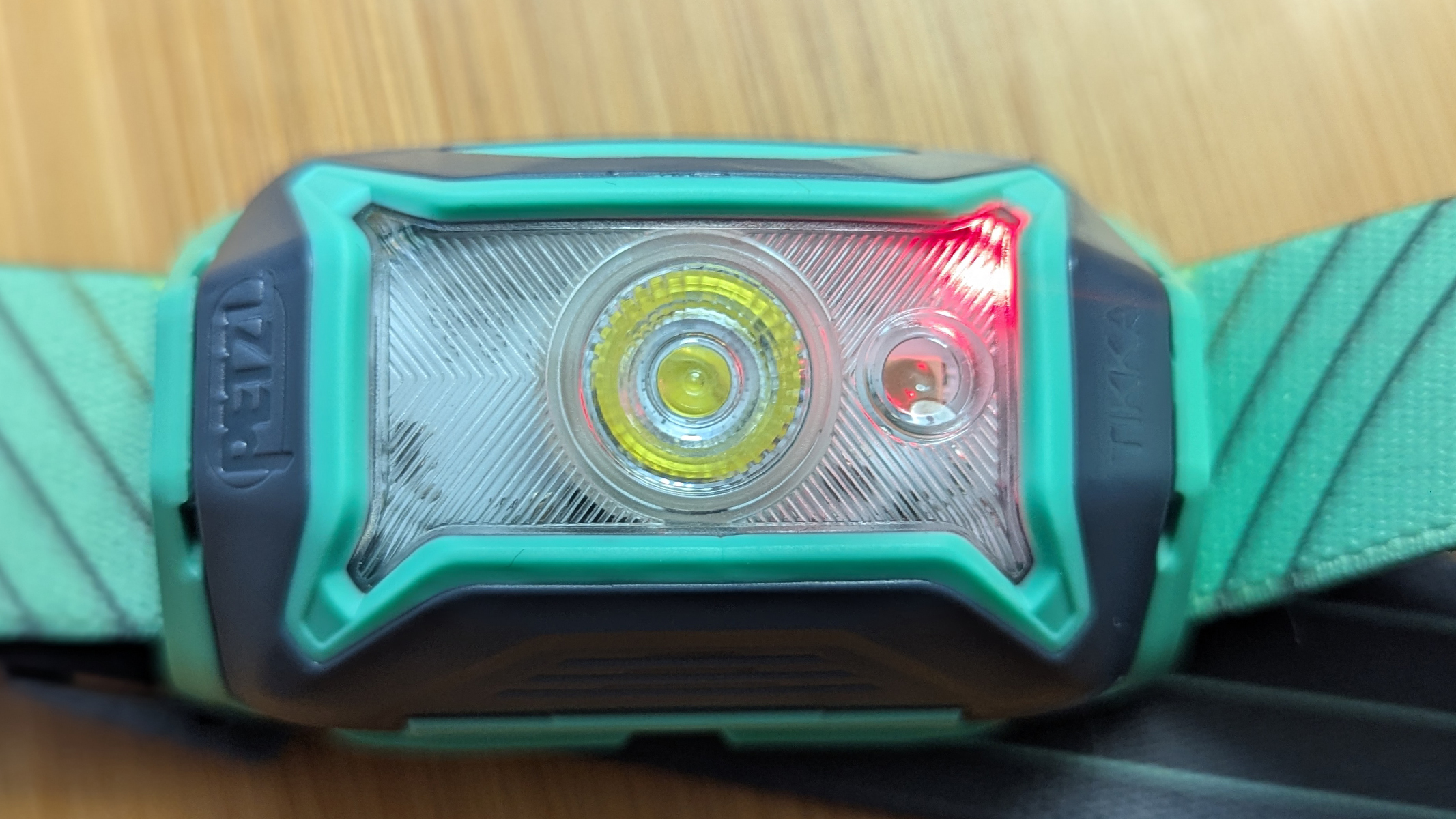 Tikka Core during review with the 'battery locked' indicator glowing