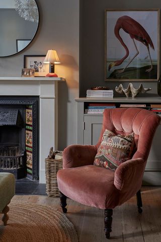 green living room with pink armchair