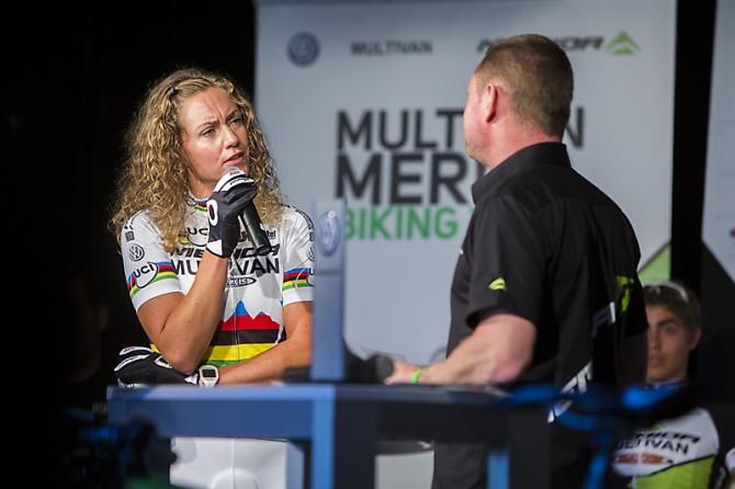 Gunn-Rita Dahle Flesjaa (Multivan Merida) speaks to an interviewer at the team presentation