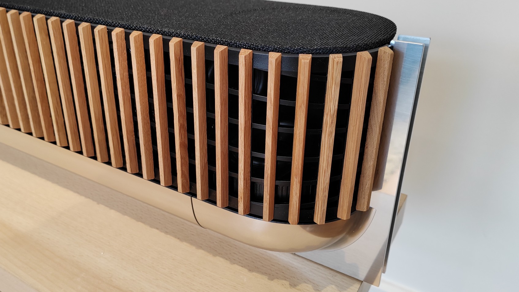 A close up of the grille design on the Bang & Olufsen Beosound Theatre Dolby Atmos soundbar