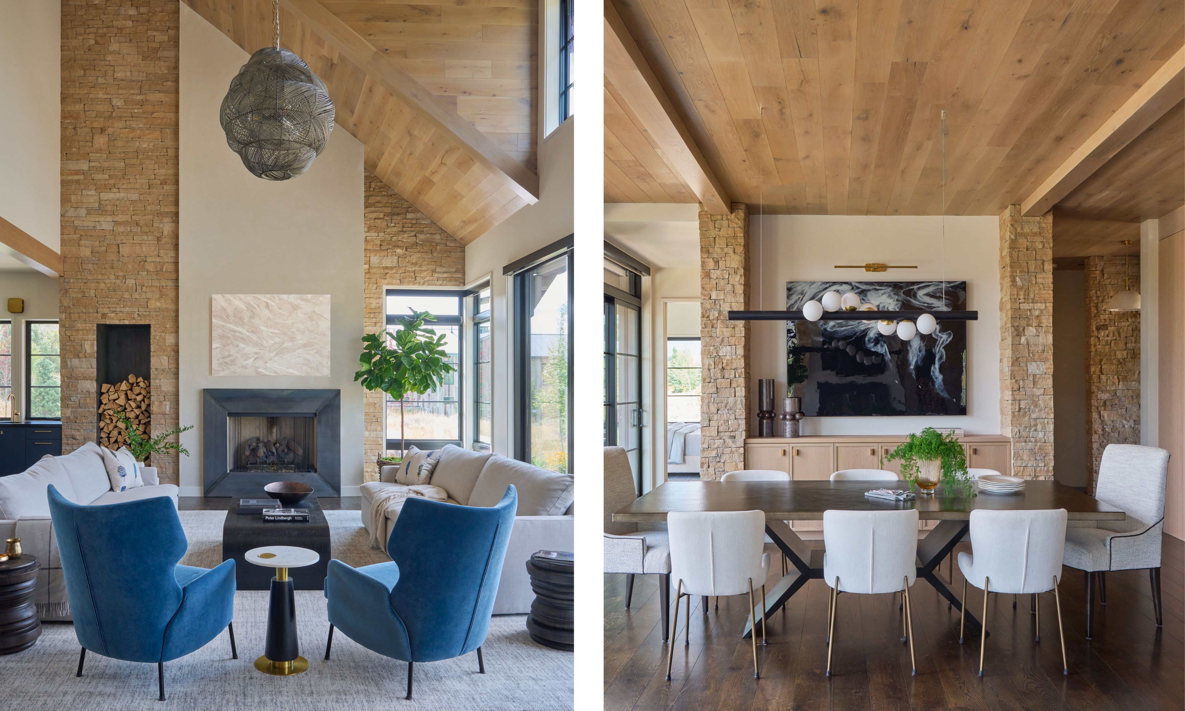 Left image: A cozy elegant living room with high, wood-paneled ceilings, warm stone accent walls and large floor to ceiling windows. Two cream sofas face a modern black fireplace, and two blue armchairs sit around a coffee table. A tall fiddle-leaf fig tree adds greenery. Right image: A dining room with a rectangular black dining table surrounded by light upholstered chairs with brass legs. The backdrop features the same warm stone walls and wood ceilings. A contemporary black-and-white art piece is on the far wall and a modern light fixture suspended above the table.