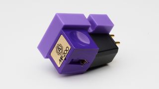 Nagaoka MP-200 moving magnet cartridge on side on white background