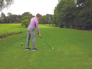 Keith Wood using the left hand side of the tee box to open up the hole