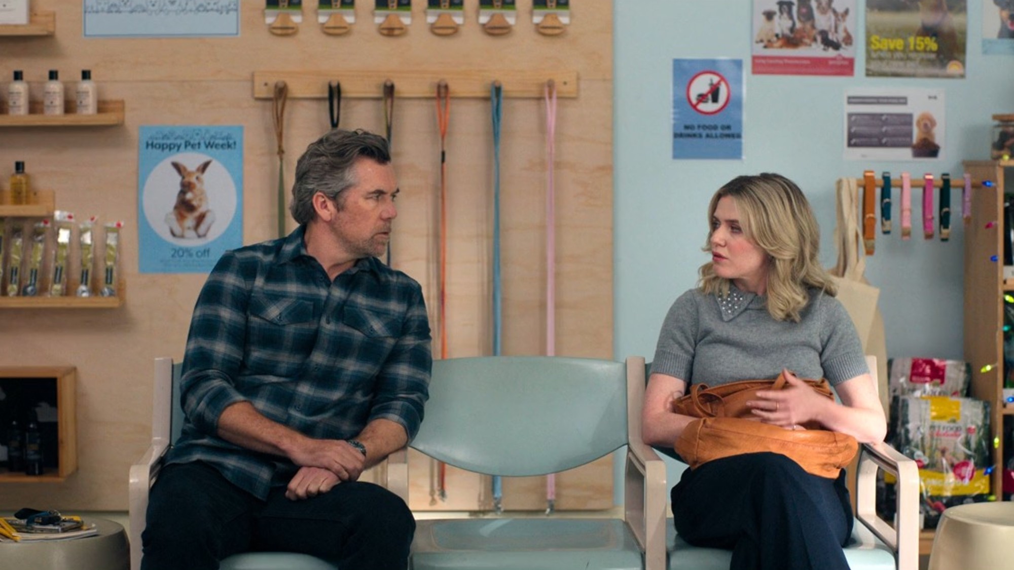 Harriet Dyer and Patrick Brammall looking across from one another in Colin from Accounts.