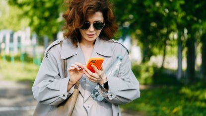 Woman texting on her phone