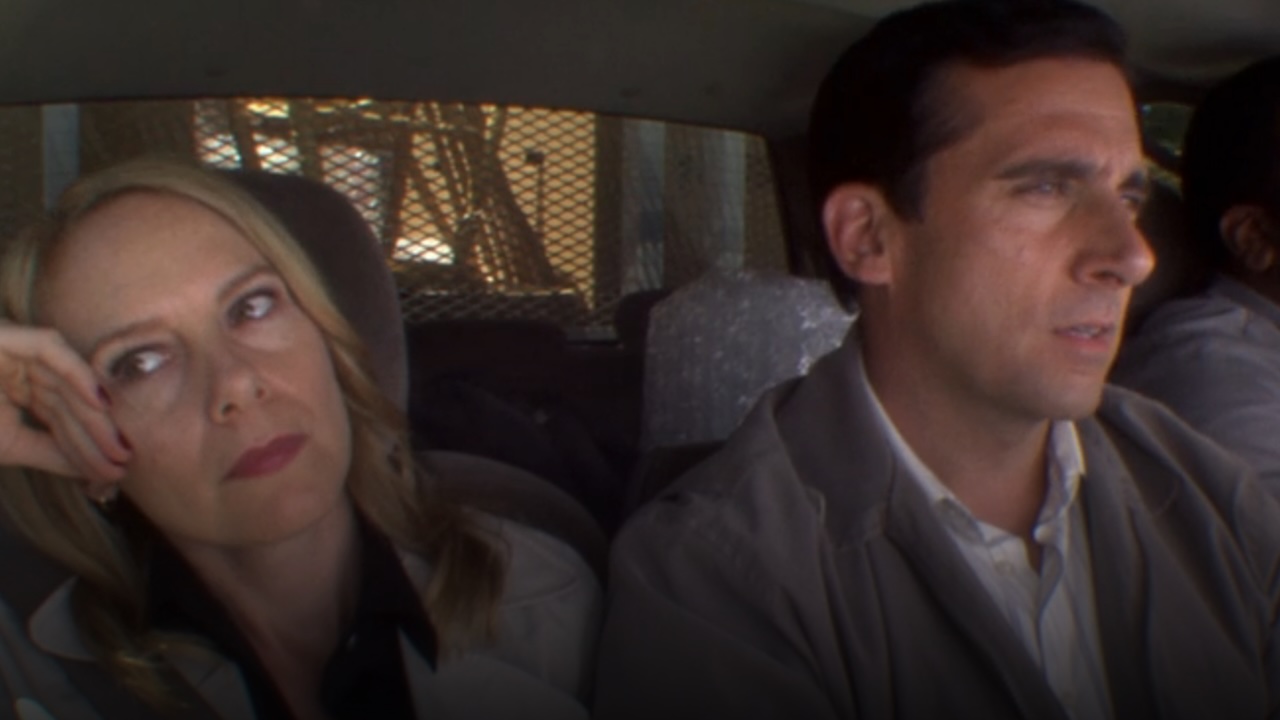 Holly and Michael looking sad in the car in The Office